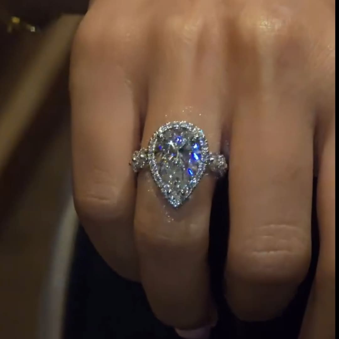 Moonlit-inspired Halo Design Pear Cut 5.0ct Engagement Ring In Sterling Silver