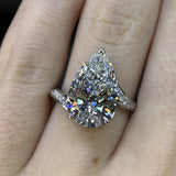 Solarii Gorgeous 6.0ct Pear Cut Hidden Halo Asymmetric Shank Engagement Ring