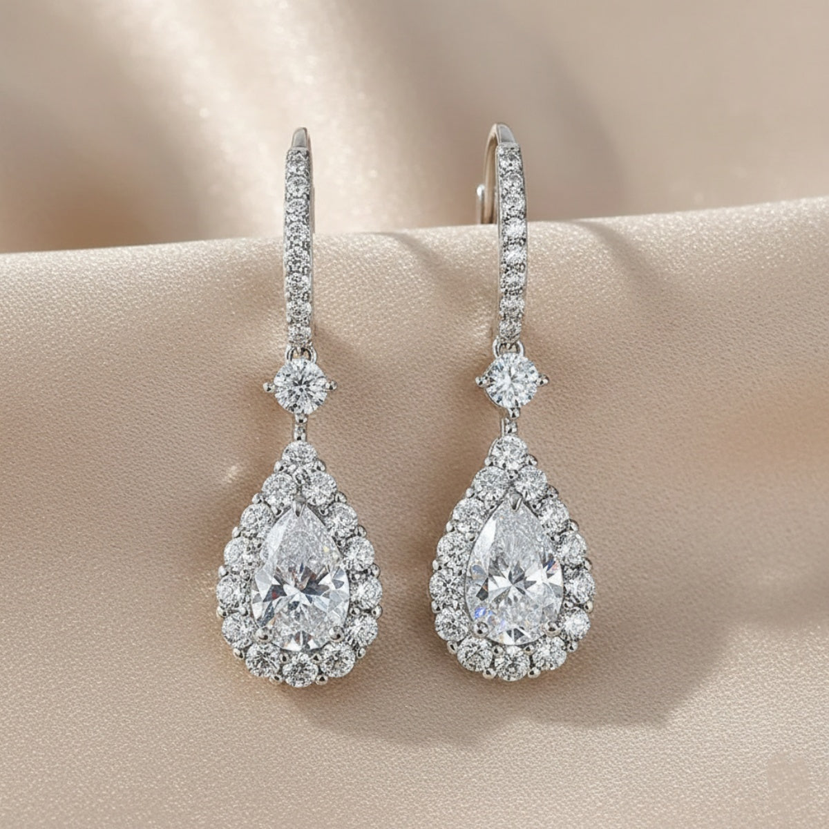 Solarii Halo White Stone Pear Cut Drop Earrings In Sterling Silver