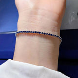 Round Cut Simulated Diamonds and Colored Gemstone Tennis Bracelet in Sterling Silver
