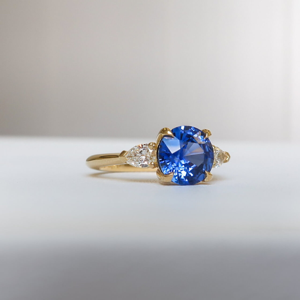 Timeless 1.5ct Round Cut Blue Stone Sterling Silver Engagement Ring