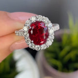 Timeless 2.0ct Oval Cut Halo Ruby Engagement Ring In Sterling Silver