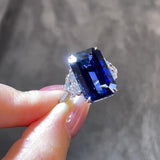 Sparkling 8.0ct Emerald Cut Blue Stone Sterling Silver Engagement Ring