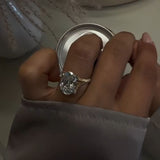 Curvaceous Split Shank Oval Cut 5.0ct Engagement Ring In Sterling Silver