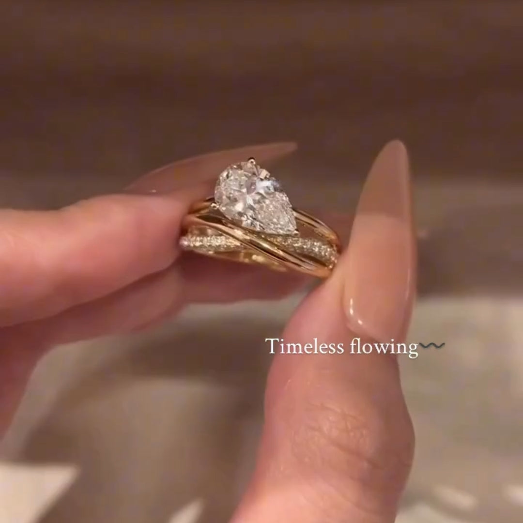 Elegant 2.0ct Pear Cut Intertwined Crossover Engagement Ring