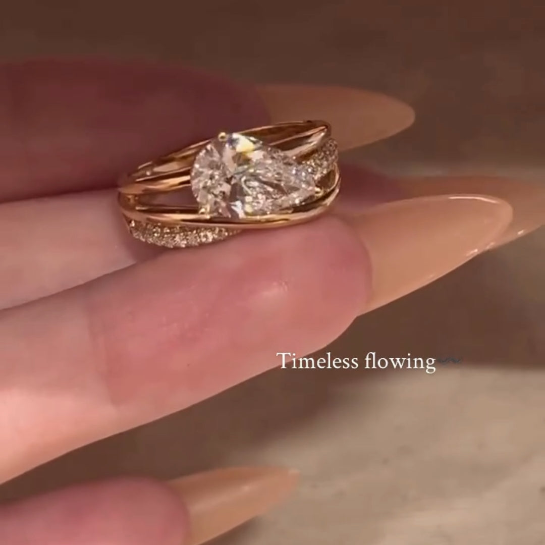 Elegant 2.0ct Pear Cut Intertwined Crossover Engagement Ring