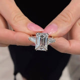 Luxurious Emerald Cut Three Stone Sterling Silver Engagement Ring