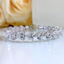 Gleaming Heart Cut Bracelet for Women In Sterling Silver