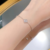 Elegant Four Leaf Clover Design Round Cut Bracelet for Women In Sterling Silver