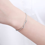 Elegant Round Cut Bow Design Bracelet For Women In Sterling Silver