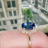 Dazzling 3.5ct Oval Cut Blue Stone Halo Sterling Silver Engagement Ring