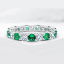 Intricate Round Cut White Stone & Emerald Stone 925 Sterling Silver Wedding Band
