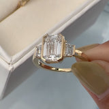Emerald Cut White Stone Ring with Yellow Gold Plating