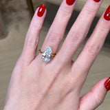 Refined Hidden Halo Pear Cut 4.0ct Engagement Ring In Sterling Silver