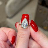 Refined Hidden Halo Pear Cut 4.0ct Engagement Ring In Sterling Silver