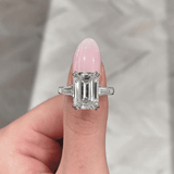 Luxurious Emerald Cut Three Stone Sterling Silver Engagement Ring