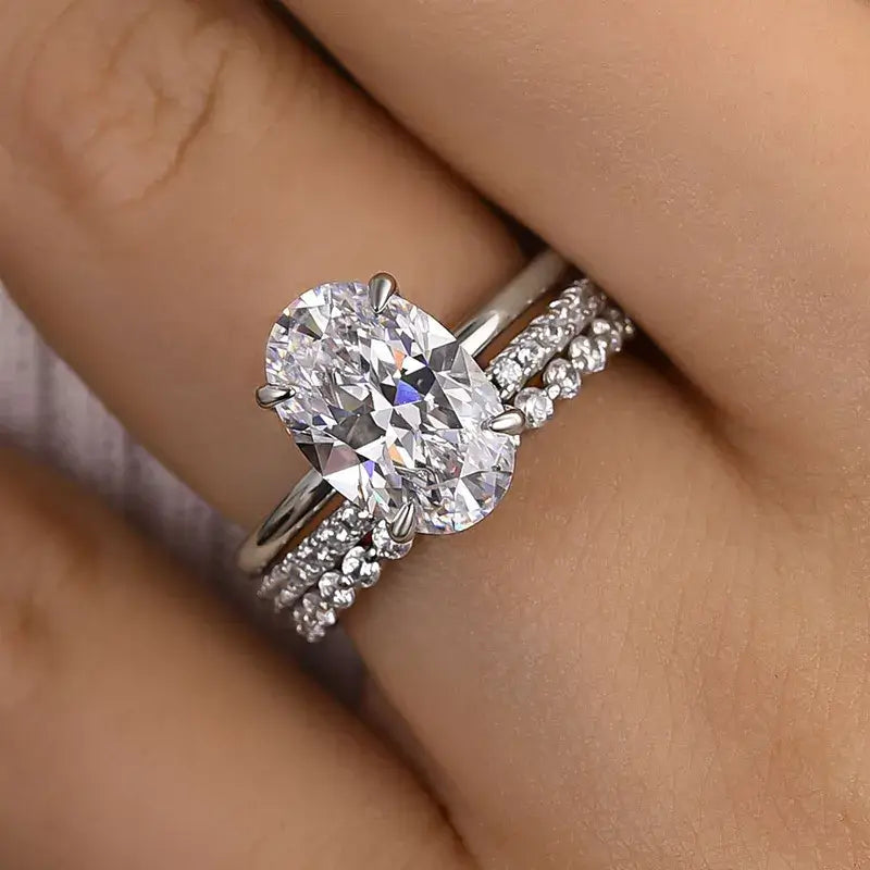 Elegant Oval Cut Solitaire Sterling Silver Bridal Set