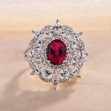 Dazzling Flower Shape 1.0ct Oval Cut Ruby Engagement Ring In Sterling Silver