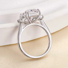 Lavish Emerald Cut 4.0ct Three Stone Engagement Ring In Sterling Silver