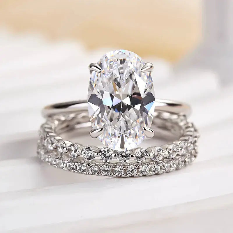 Elegant Oval Cut CZ Solitaire Sterling Silver Bridal Set