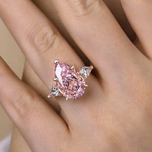 Majestic Pear Cut 4.0ct Pink Stone Three Stone Engagement Ring In Sterling Silver