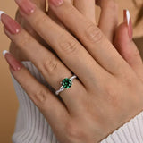 Timeless 1.25ct Twist Round Cut Emerald Green Engagement Ring In Sterling Silver