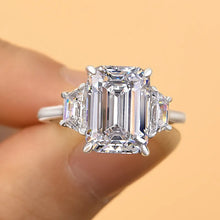 Lavish Emerald Cut 4.0ct Three Stone Engagement Ring In Sterling Silver
