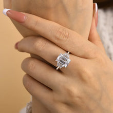 Lavish Emerald Cut 4.0ct Three Stone Engagement Ring In Sterling Silver