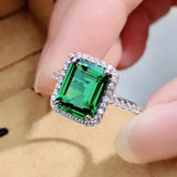 Luxurious Emerald Cut 3.5ct Halo Engagement Ring In Sterling Silver