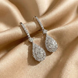 Solarii Halo White Stone Pear Cut Drop Earrings In Sterling Silver