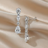 Solarii Linear White Stone Round and Pear Cut Drop Earrings In Sterling Silver