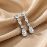 Solarii Linear White Stone Round and Pear Cut Drop Earrings In Sterling Silver