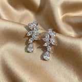 Solarii Floral Cluster White Stone Pear Cut Drop Earrings In Sterling Silver