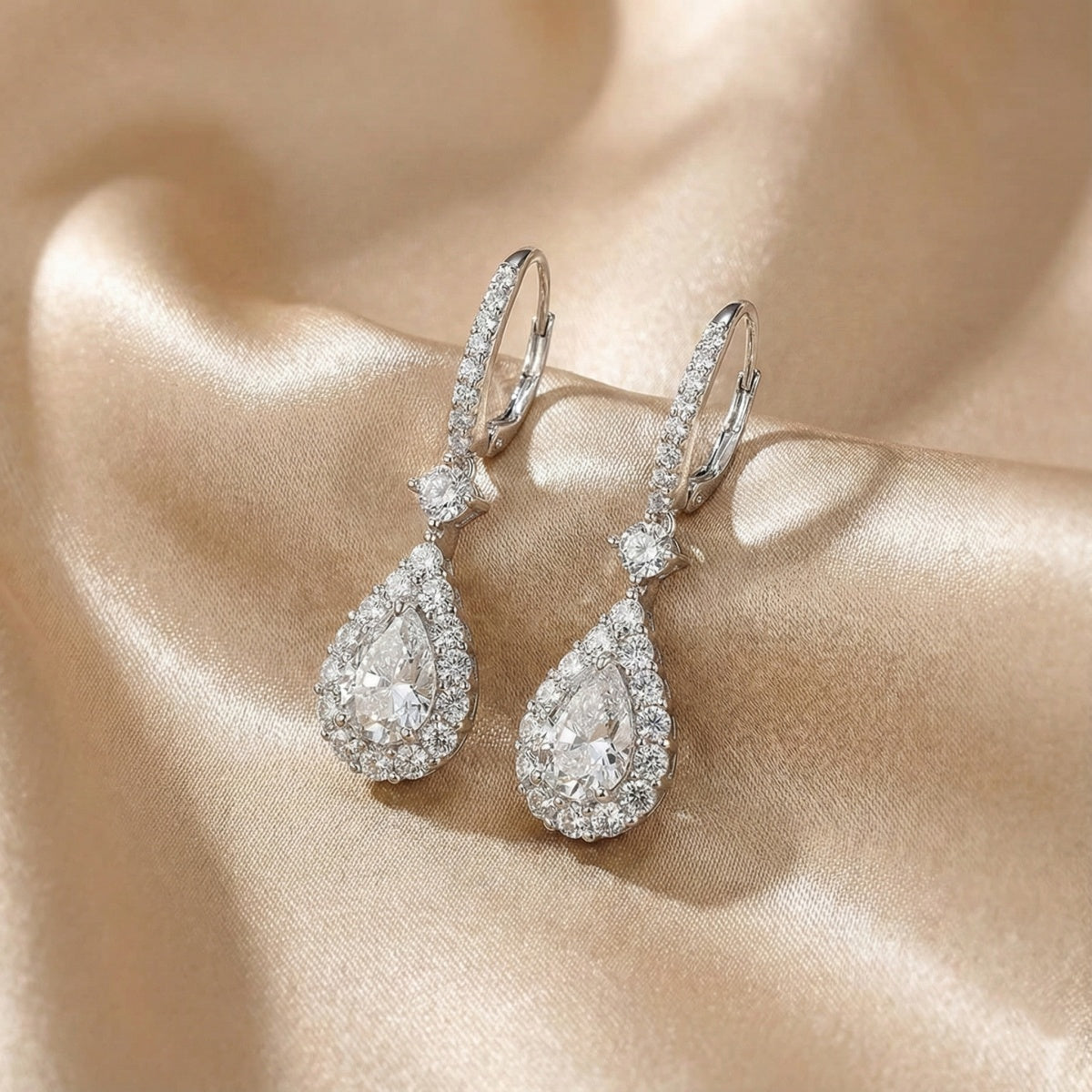 Solarii Halo White Stone Pear Cut Drop Earrings In Sterling Silver