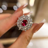 Dazzling Flower Shape 1.0ct Oval Cut Ruby Engagement Ring In Sterling Silver