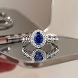 Radiant 1.0ct Blue Sapphire Oval Cut Halo Engagement Ring In Sterling Silver