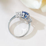 Luxurious 3.75ct Blue Sapphire Oval Cut Three Stones Engagement Ring In Sterling Silver