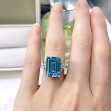 Bright Emerald Cut Blue Stone Sterling Silver Engagement Ring