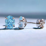 Sparkling Oval Cut Aquamarine Blue Sterling Silver Earrings