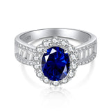 Oval Cut Blue Stone Halo Sterling Silver Engagement Ring