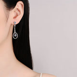 Round Cut White Stone Tennis Racket Design Earrings in White Gold Plating with Moissanite, 925 Sterling Silver
