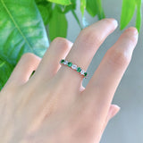 Intricate Round Cut White Stone & Emerald Stone 925 Sterling Silver Wedding Band