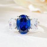 Luxurious 3.75ct Blue Sapphire Oval Cut Three Stones Engagement Ring In Sterling Silver