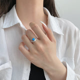 Heart of the Ocean: White Gold Heart Cut Blue Stone Ring