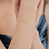 Round Cut Moissanite Cross Bracelet in Sterling Silver