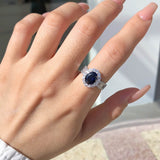 Oval Cut Blue Stone Halo Sterling Silver Engagement Ring