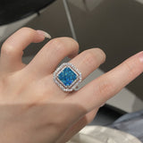 Radiant Cut Blue Stone Halo Sterling Silver Engagement Ring