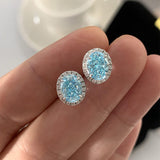 Sterling Silver Halo Aquamarine Blue Oval Cut Drop Earrings