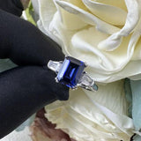 Gleaming 2.5ct Blue Sapphire Emerald Cut Engagement Ring In Sterling Silver