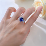 Luxurious 3.75ct Blue Sapphire Oval Cut Three Stones Engagement Ring In Sterling Silver